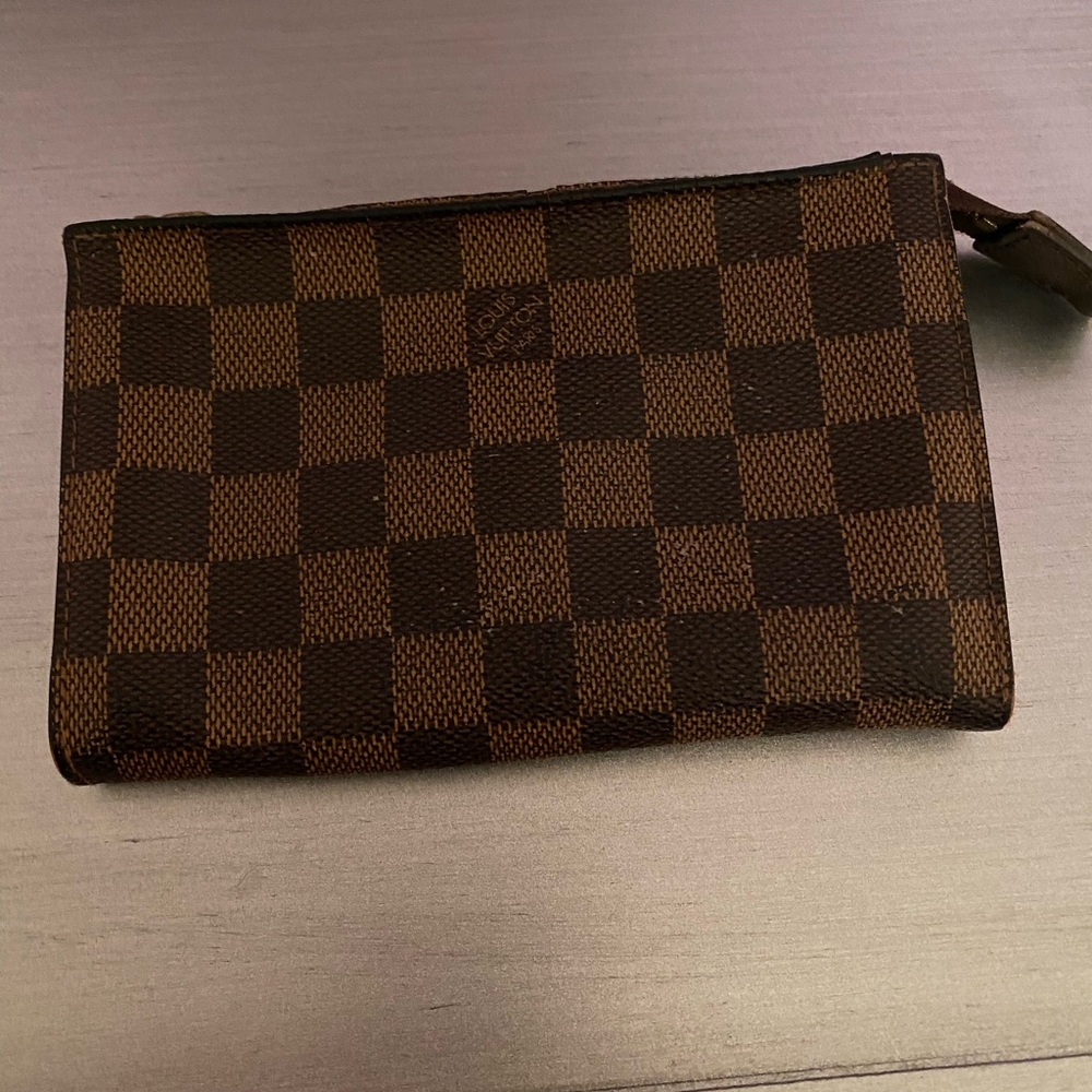 Louis Vuitton Damier print zippered inset.